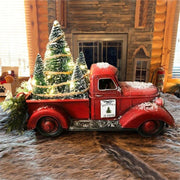 L'albero di Natale del camion rosso di Natale ha condotto le luci che lampeggiano gli ornamenti di Natale